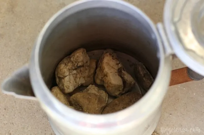 vintage coffee pot with rocks