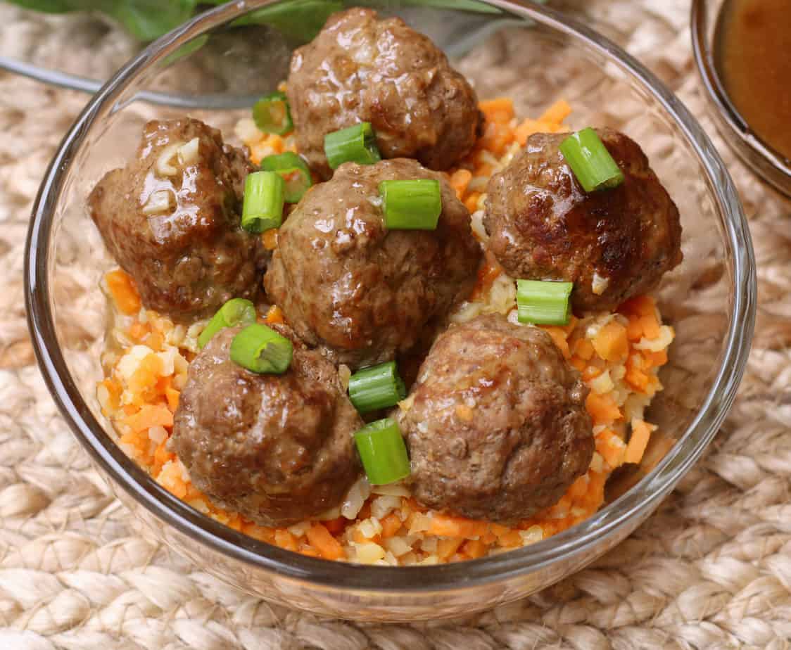 whole30 meatballs and gravy over riced veggies