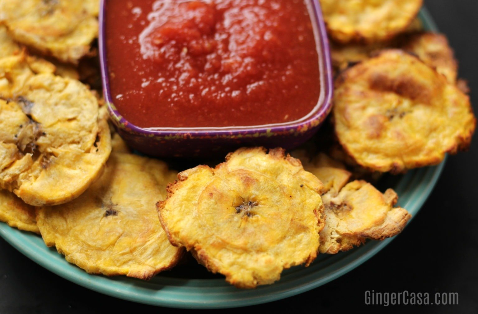 Plate of tostones and salsa.