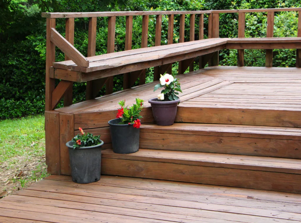 deck with flowers - pollinator friendly yard