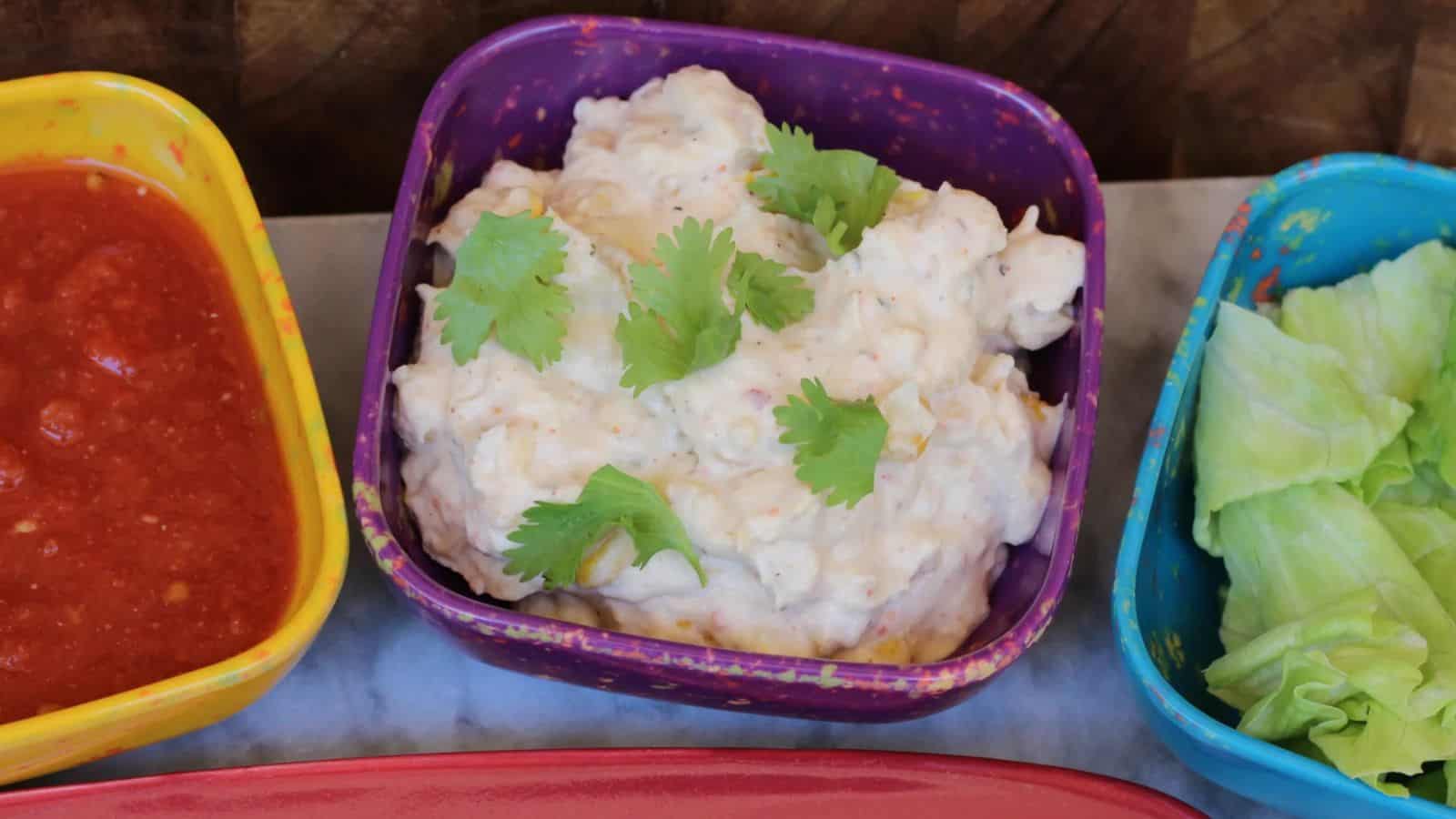 Bowl of dip with cilantro.