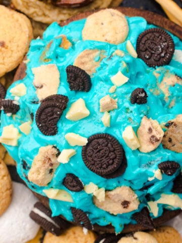 bowl of cookie monster dip with cookies and pretzels